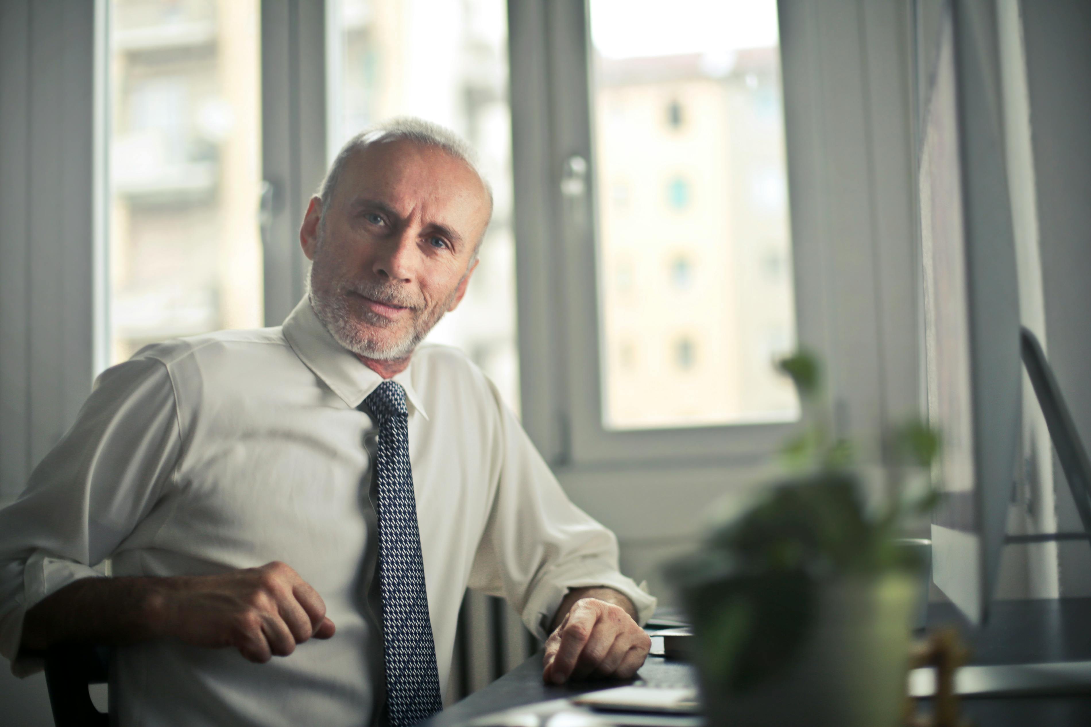 Businessman standing confidently in a warehouse